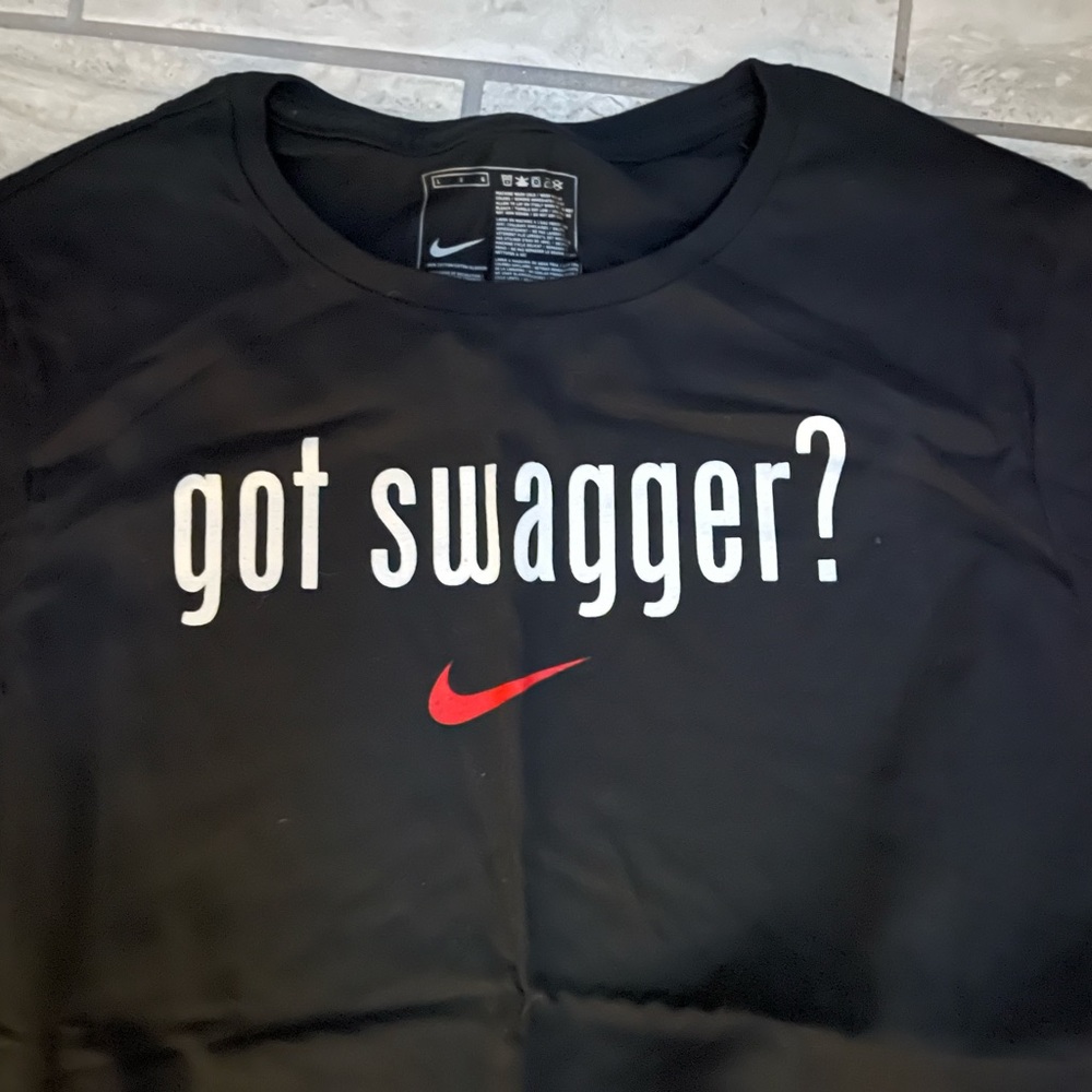 Never sold in stores NIKE T shirt. Worn once.  Women’s large